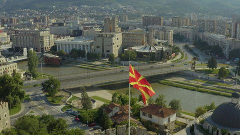 
Aerial view of Skopje Macedonia. Drone flight over Above the towers of the old historic fortress in the city center on the walls of which fly the Macedonian flags.