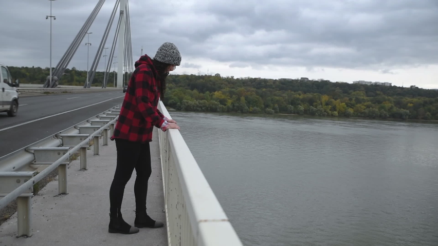 woman jumping off bridge