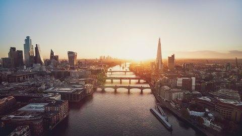 Stunning blissful morning, Establishing Aerial View Shot of London UK, London Skyline, City of London & Riverside, Millennium Bridge, Southwark Bridge, London Bridge & Tower Bridge, United Kingdom