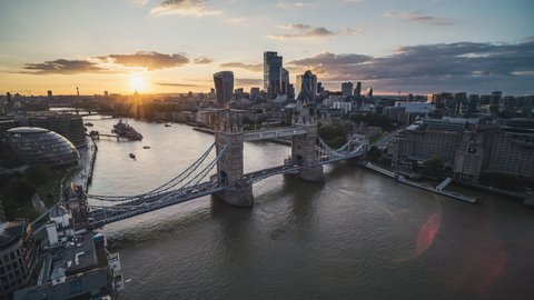 Majestic Tower Bridge & The City of London, Calm Sunset, Establishing Aerial View Shot of London UK, United Kingdom