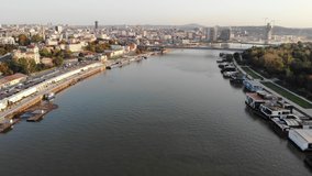 Sava river and city skyline of Belgrade, Serbia. Drone video, aerial view.