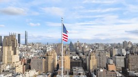 American USA flag waiving in the wind with New York City in the background. - Powered by Shutterstock - Get 15% off with code: PIKWIZARD15