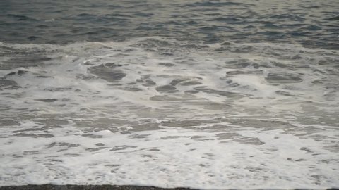 Natural background with beach and sea views. Slow-motion video