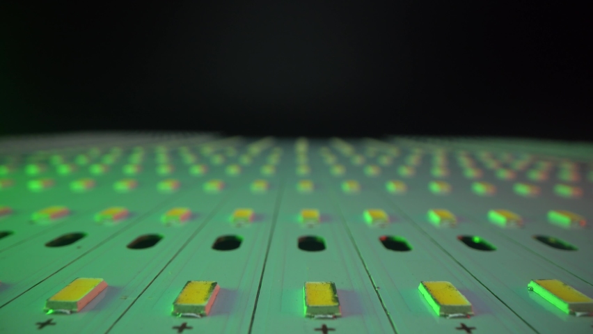 Factory of create and manufacture new mordern light LED panels. Dolly shot above panels in | Shutterstock HD Video #1061698144