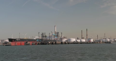 Rotterdam, The Netherlands - Circa 2019: Oil storage silos in the port of Rotterdam