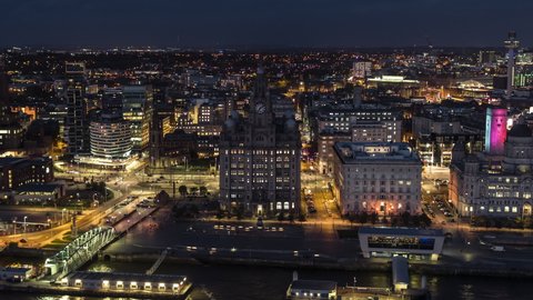 Establishing Aerial View Shot of Liverpool at night evening, super long panorama, City Waterfront, United Kingdom ( part 1 )