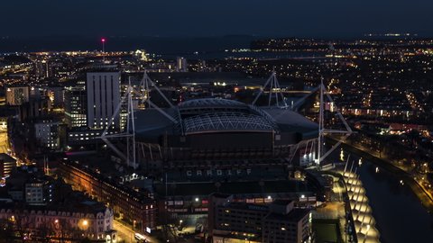 Cardiff, United Kingdom - circa 2020: Aerial View Shot of Cardiff UK, Amazing Principality Stadium, Wales, United Kingdom night evening