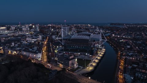 Aerial View Shot of Cardiff UK, Wales, United Kingdom night evening, tracking shot