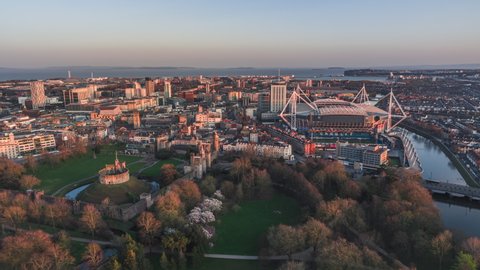 Establishing Aerial View Shot of Cardiff UK, Wales, United Kingdom sunset late afternoon