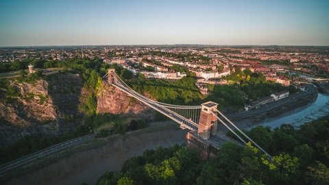 Aerial View Shot of Bristol UK, Clifton Suspension Bridge & City, United Kingdom sunset late afternoon