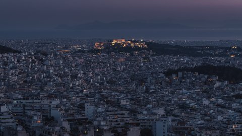 Establishing Aerial View Shot of Athens, Parthenon at evening night, Epic Acropolis, Greece