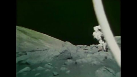 CIRCA 1969 - An Apollo 11 astronaut jumps along the lunar surface.