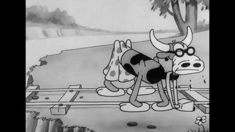 CIRCA 1931 - In this animated film, Foxy tries to get a stubborn cow off his trolley's railway and tramps living under it sing "Smile Darn Ya Smile."
