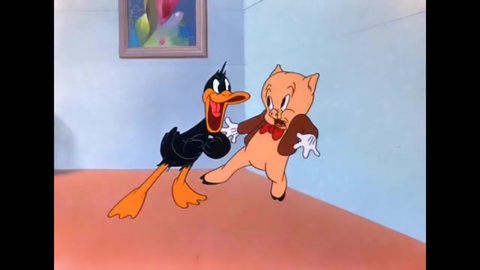 CIRCA 1943 - In this animated film, agent Daffy Duck tries to sell talent scout Porky Pig on his client, who promptly suffers a bad coughing fit.