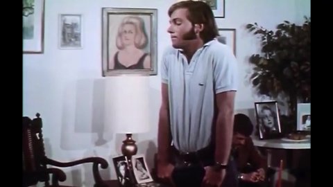 CIRCA 1972 - In this mystery movie, a detective accuses a young man of being gay and killing the mother who tried seducing him.