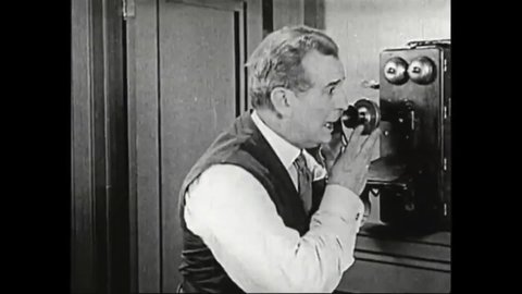 CIRCA 1923 - In this drama film, a woman phones an evil banker to tell him she knows about his crimes.