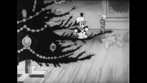 CIRCA 1933 - In this animated film, a boy saves a burning Christmas tree by filling a bagpipe with water and dousing it.