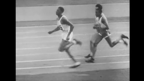 CIRCA 1930s - Athletes Jesse Owens, Cornelius Johnson and Ralph Metcalfe compete in the Summer Olympics, in Berlin, Germany, in 1936.