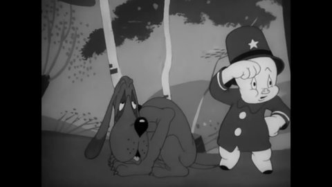 CIRCA 1943 - In this animated film, policeman Porky Pig and his bloodhound trail a lynx spy.