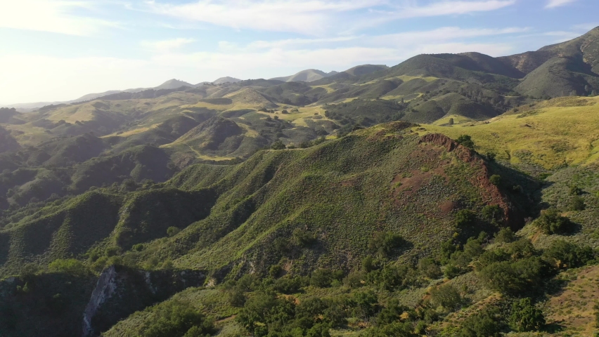 SANTA BARBARA COUNTY, CALIFORNIA - CIRCA 2020 - Beautiful aerial over remote hills and mountains in Santa Barbara County, Central California. Royalty-Free Stock Footage #1061730808