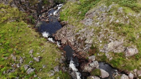 Aerial Drone Shot of Birker Force Waterfall in the Eskdale Valley, Lake District, UK