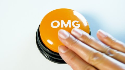 OMG! Oh my god, so excited and thrilled. Woman pushing orange glossy OMG button, shocked and surprised by unexpected things. Expressing surprise and astonishment. Abbreviation, slang for social media.