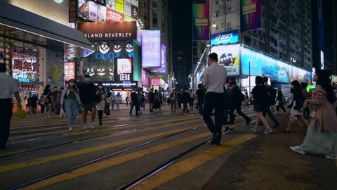 Oct 2020 : Hong Kong ,China ,Asia : Peoples crossing the road at Causeway Bay street 