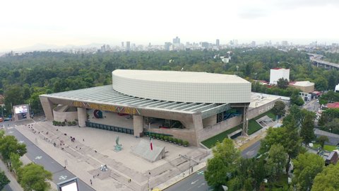 Mexico city - september 12, 2019:  Panoramic aerial view of the famous National Auditorium on one side of the busy Reforma avenue surrounded by the Chapultepec forest