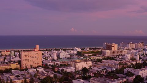 Cinematic Aerial Shot of Miami South Beach in twilight/sunset 