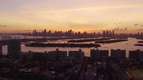 Cinematic Aerial Shot of Miami South Beach in twilight/sunset 