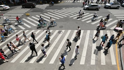 Group of people crossing the crosswalk, time lapse