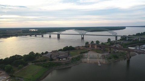 Aerial View of Hernando de Soto Bridge Above Mississippi River Between Tennessee and Arkansas States, Memphis USA. Landmark on Summer Sunset Sunlight, Drone Shot