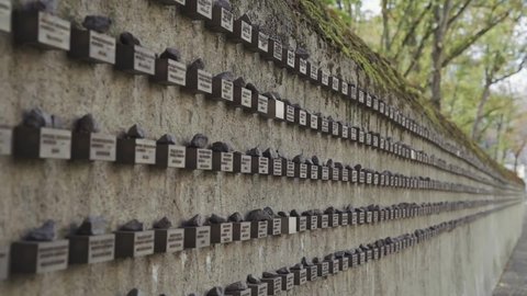 Wall with names of Holocaust victims. Old Jewish Cemetery. Battonstrasse next to Judengasse in Frankfurt am Main Germany. 4k. Slow Motion./ Gedenktafel jüdische Bürger beim alten jüdischen Friedhof.
