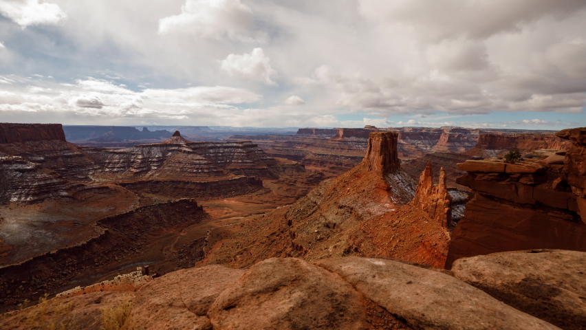 Time Lapse of the clouds moving above the amazing and rugged landscapes of Southern Utah. Royalty-Free Stock Footage #1061777833