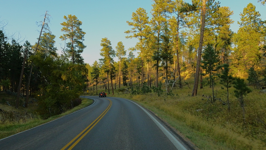 Driving POV Custer South Dakota forest mountains Fast Motion 4K. Black Hills of South Dakota. Mountain, valley, landscape scenic discovery. State Park with wildlife, lakes, campgrounds and picnic area