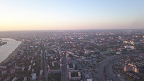D-Cinelike. Russia, Omsk - July 16, 2018: View of the city of Omsk during sunset, Aerial View