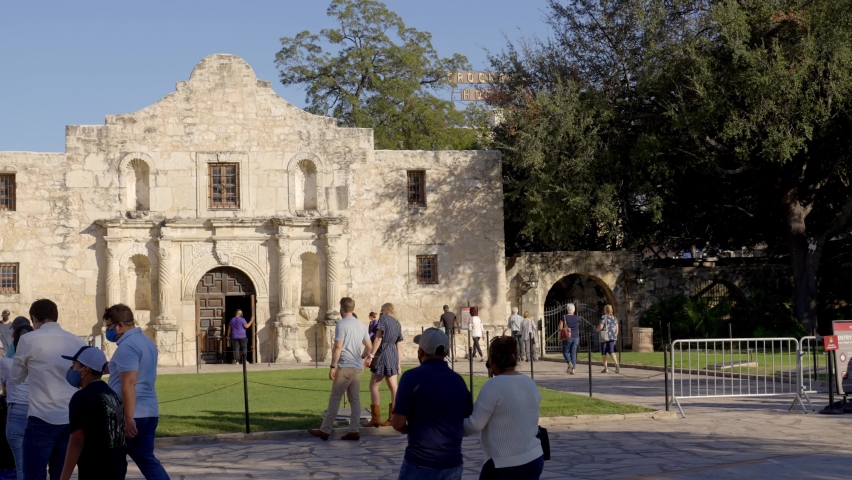 Slow Motion of Tourists Entering The Alamo Visitor Center and Destination Royalty-Free Stock Footage #1061795626