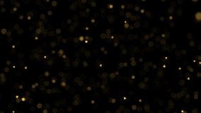 Bokeh effect with golden particles and blurred shiny magical dust on black background, bright glitter holiday party animated wallpaper, dark luxury shimmering hd animation.