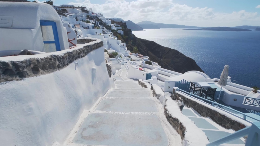 Walking down the stairs of Oia, Santorini. | Shutterstock HD Video #1061825884