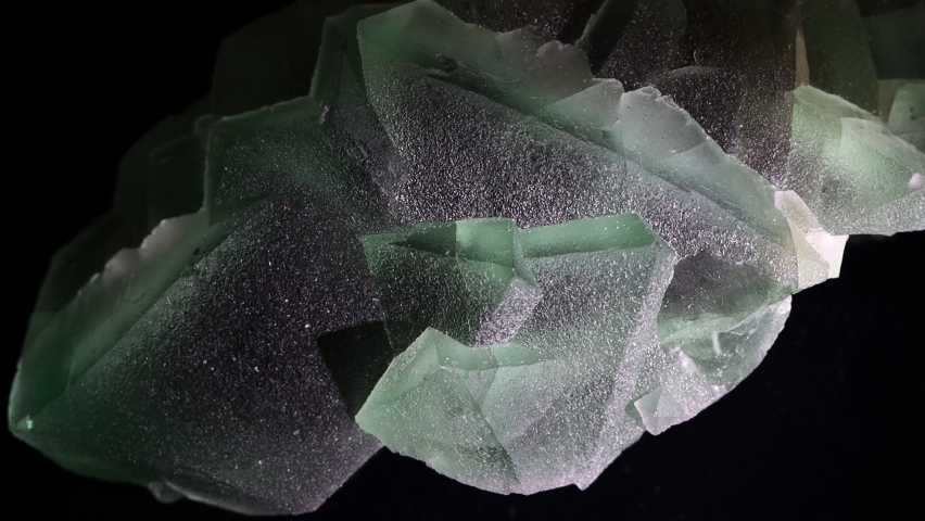 Fluorite crystals show their natural beauty as they shimmer in this unusually large specimen.