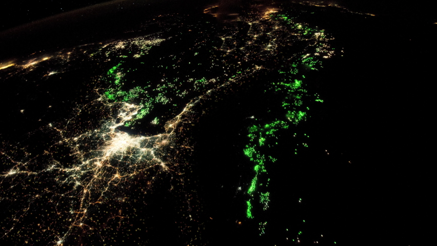 City of Bangkok Thailand satellite aerial view by night with moving and flashing lights. Images furnished by Nasa