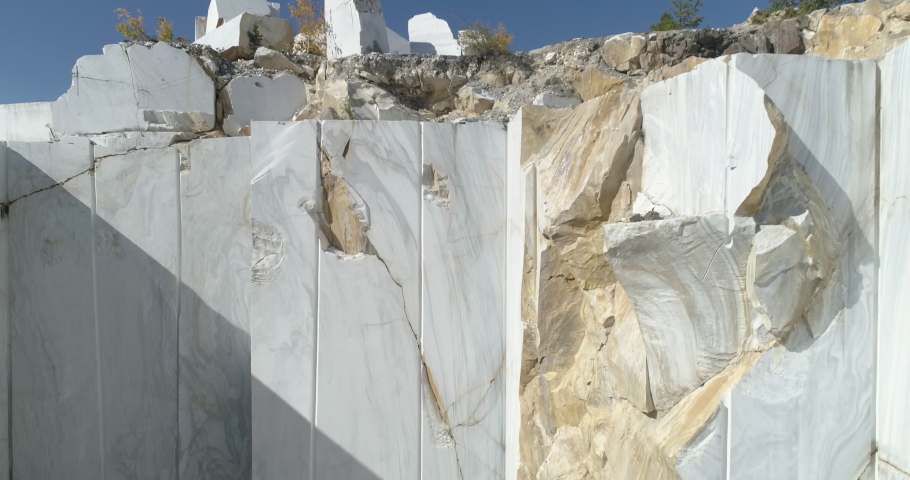 Huge marble blocks at marble quarry site. Royalty-Free Stock Footage #1061832445