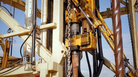 Drilling rig in operation, drilling a well, close-up