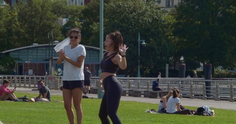 New York, New York United States - September 27 2020: Dance instructor gives dance class to bachelorette party on pier 45 in manhattan. Covid-19 business closures force people and businesses outdoors.