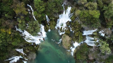 Beautiful aerial view of Kravice Waterfalls. 
Bird's eye view shot of beautiful waterfall.