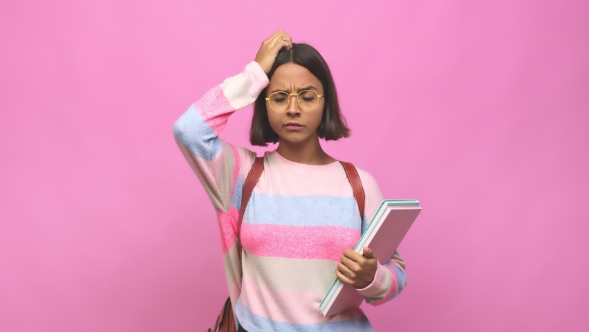 Young student indian woman being shocked, she has remembered important meeting Royalty-Free Stock Footage #1061851681