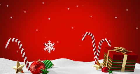 Digital animation of snowflakes falling over christmas bauble, gift and candy cane on snow against red background. christmas festivity celebration tradition concept