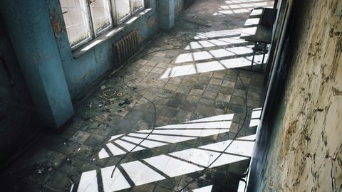 A creepy ghost girl in a white dress walking through an abandoned mystical hospital. Looping animation for apocalyptic, mystical and fantastic backgrounds.