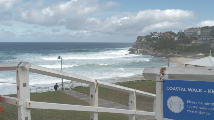 Bronte Beach Coastal Walk Fence With Social Distancing Sign - Coronavirus Outbreak In Sydney, NSW, Australia. - close up shot