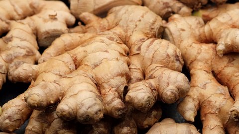 whole ginger root close up, rotate